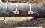 Installation an einem 60 Jahre alten DN200 Rohr aus Gusseisen Installation an einem 60 Jahre alten DN200 Rohr aus Gusseisen